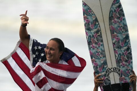 Native Hawaiians ‘reclaim’ surfing with Moore’s Olympic gold