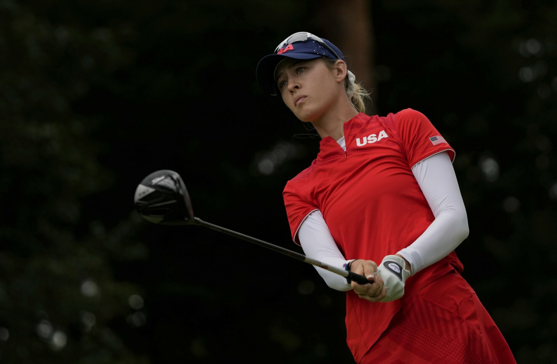 Nelly Korda, of the United States, watches her tee shot on the 18th hole during the final round of the women's golf event at the 2020 Summer Olympics, Saturday, Aug. 7, 2021, at the Kasumigaseki Country Club in Kawagoe, Japan. (AP Photo/Andy Wong)