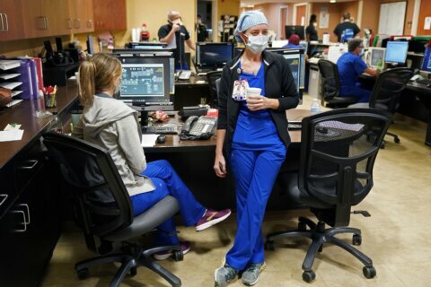 Ida slams Louisiana hospitals brimming with virus patients