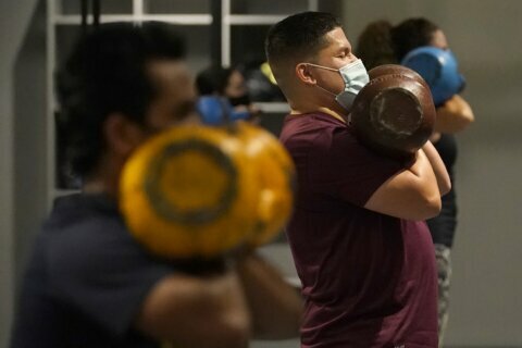 Fitness leader changes tune on DC mask mandate