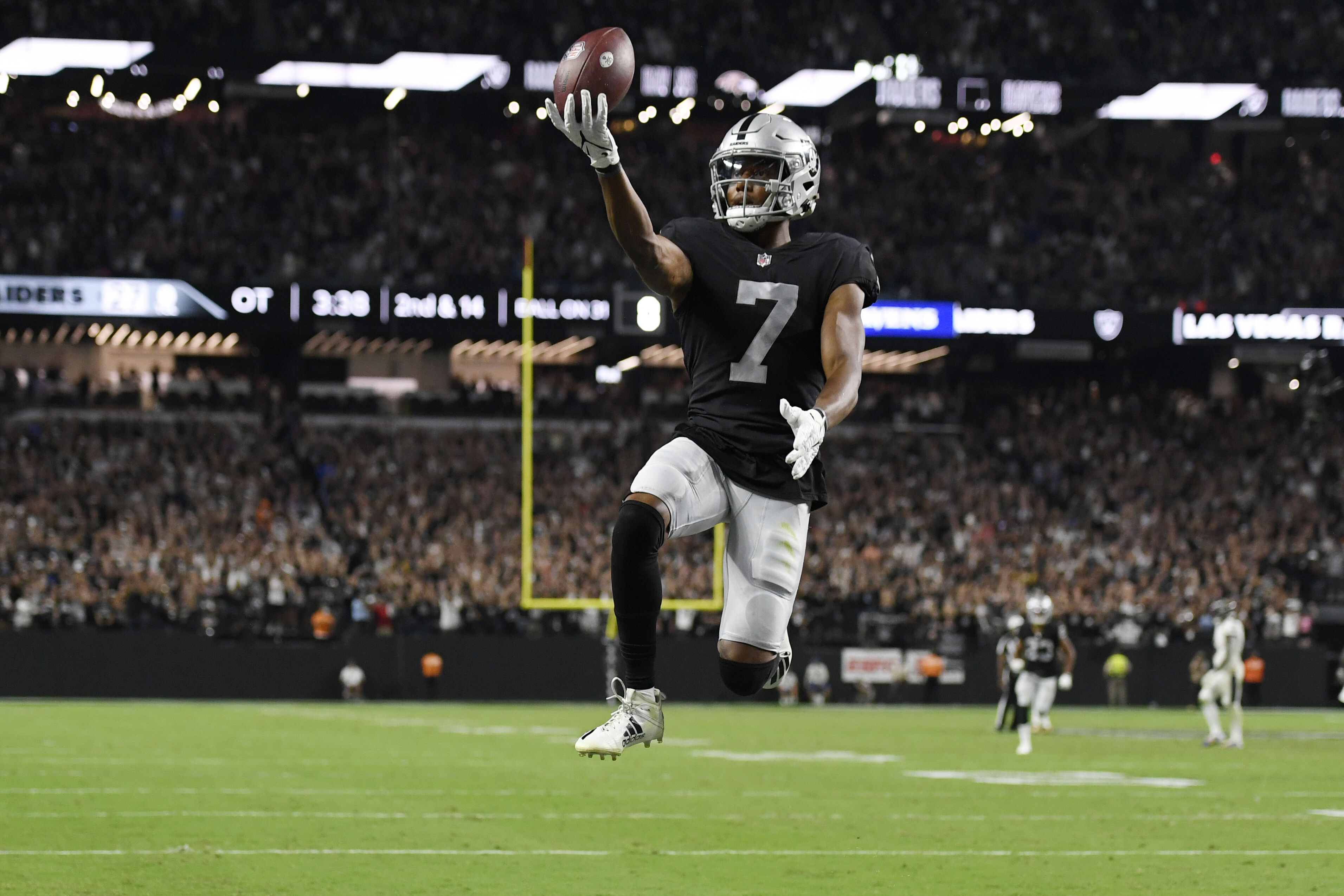 Carr's TD pass caps Raiders rally past Ravens 33-27 in OT - WTOP News