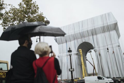 ‘A big gray elephant’: Paris’ Arc de Triomphe is wrapped up