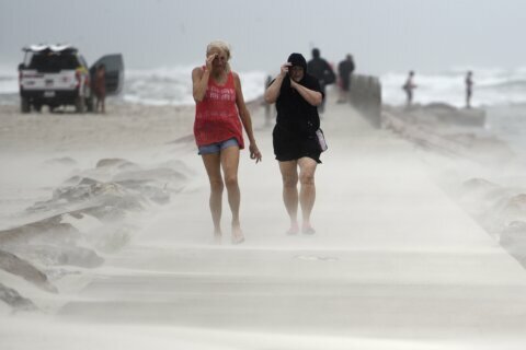 Nicholas, now a tropical depression, still douses Gulf Coast