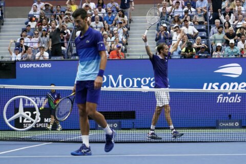 Medvedev overcomes pressure, Djokovic to win U.S. Open