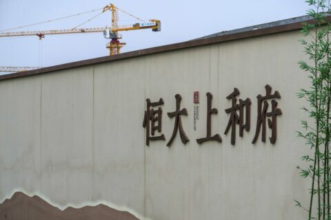 EXPLAINER: Chinese builder’s debt struggle rattles investors