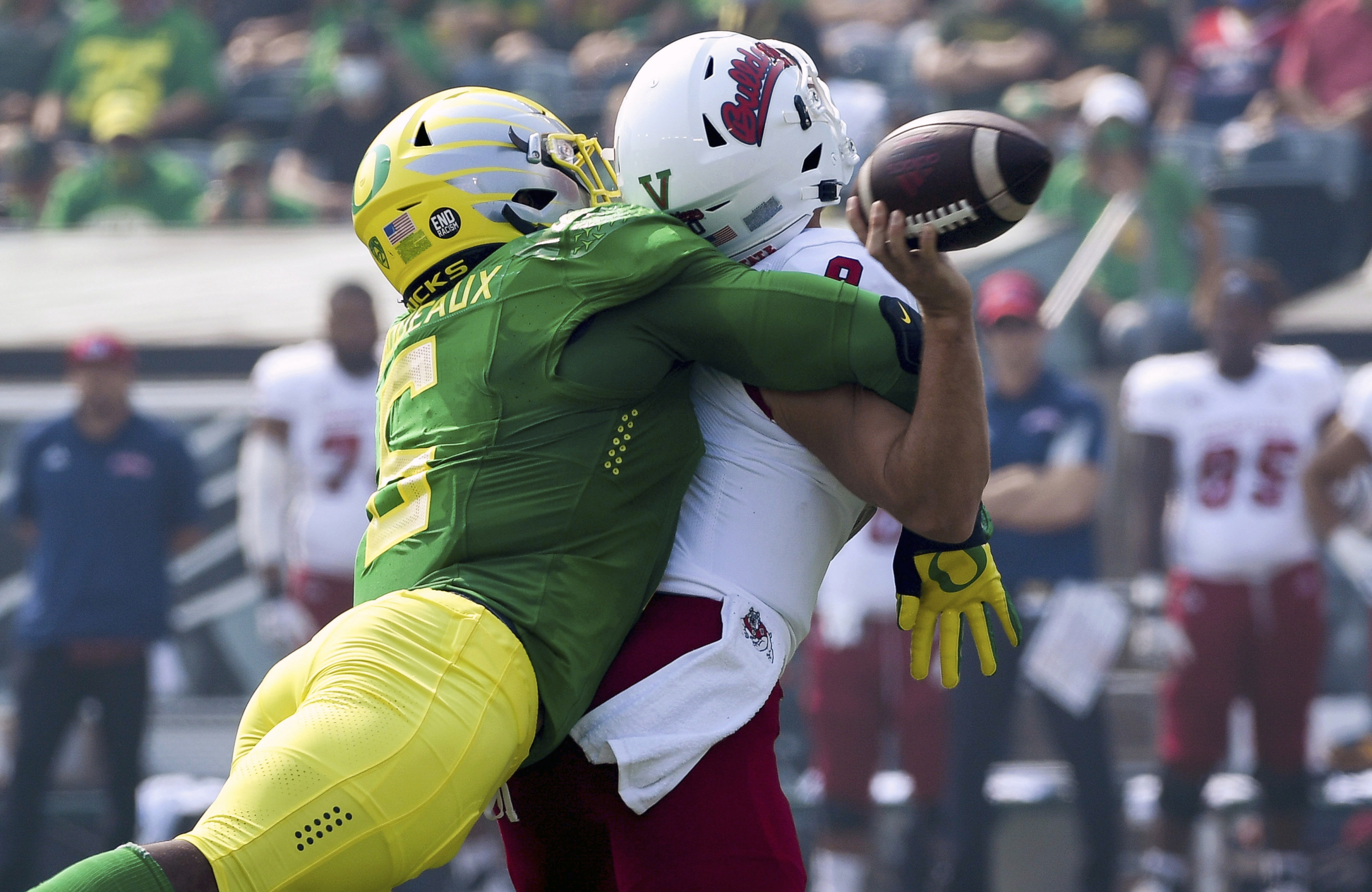 Kayvon Thibodeaux of the Oregon Ducks rushes against the Colorado