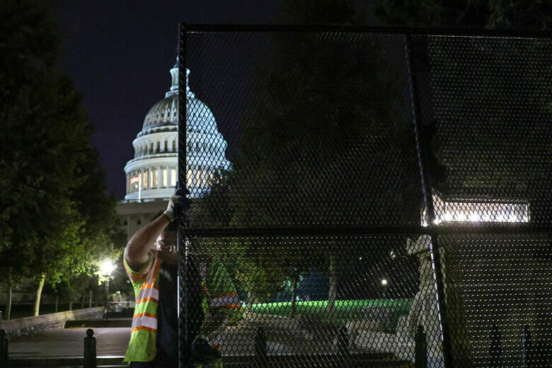 WASHINGTON, DC - SEPTEMBER 15: Workers install security fencings around the U.S. Capitol in preparations for this weekend's Justice for J6 Rally on September 15, 2021 in Washington, DC. Security in the Nation's Capital has been increased in preparation for the Justice for J6 Rally, a rally for support for those who rioted at the U.S. Capitol on January 6 to protest the 2020 presidential election outcome. (Photo by Kevin Dietsch/Getty Images)
