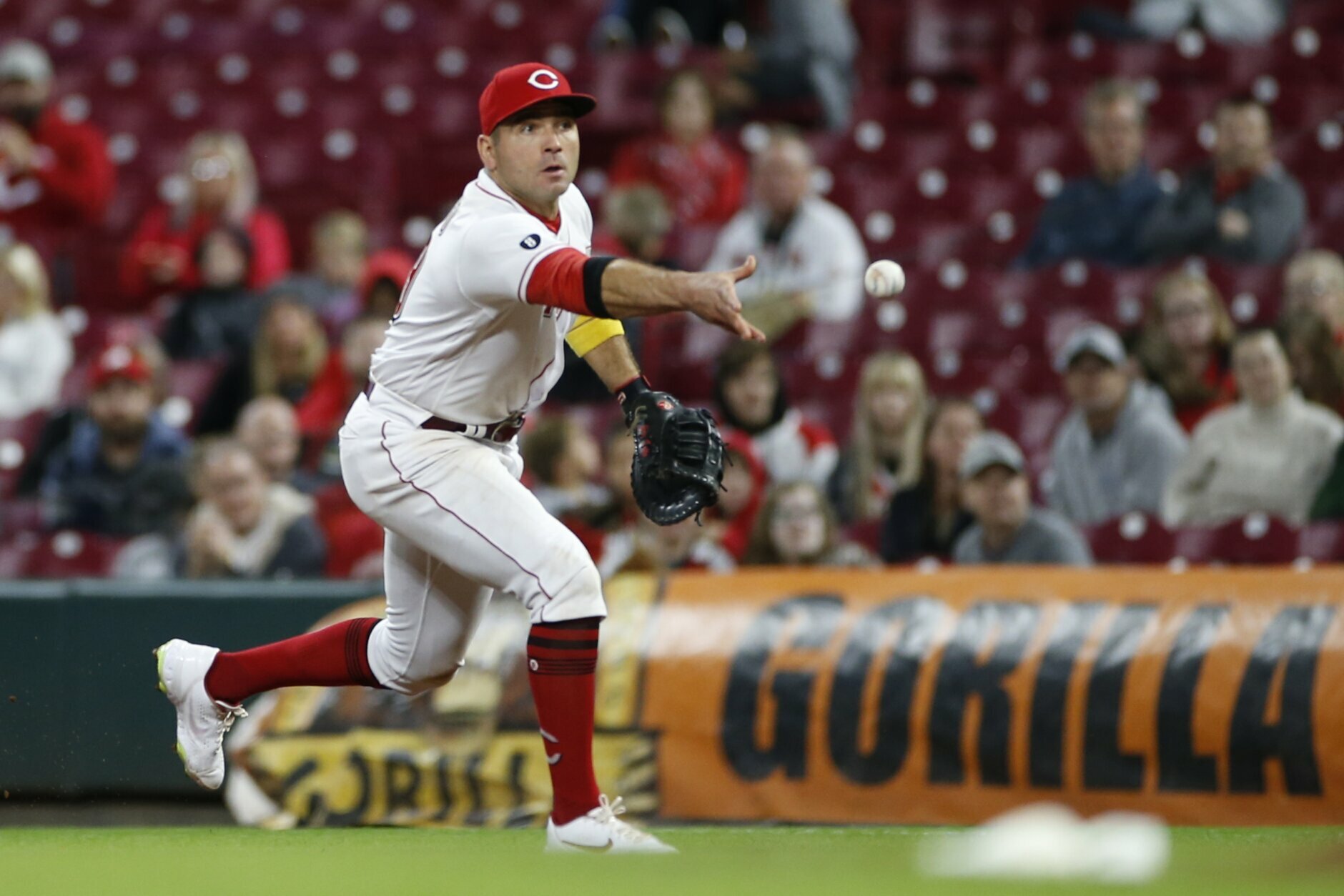 Tucker Barnhart could only watch as a ball went through the webbing of his  glove