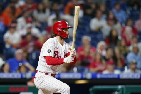 Harper’s throw to plate saves Phillies’ 4-3 win over O’s