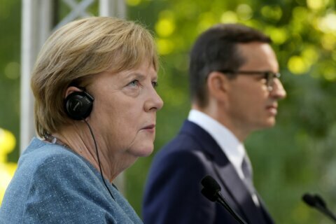 Merkel calls migrant push at EU's border 'unacceptable'