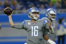 Detroit Lions quarterback Jared Goff (16) throws against the Baltimore Ravens in the first half of an NFL football game in Detroit, Sunday, Sept. 26, 2021. (AP Photo/Duane Burleson)