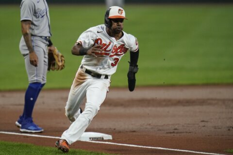 Mullins homers again, Orioles hit 3 to beat Royals 7-3