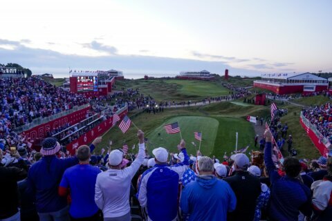 The Latest: U.S. takes commanding 11-5 lead at Ryder Cup