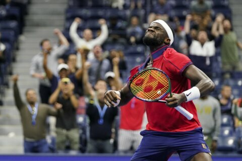 The Latest: Tiafoe beats No. 5-seed Rublev in late Open