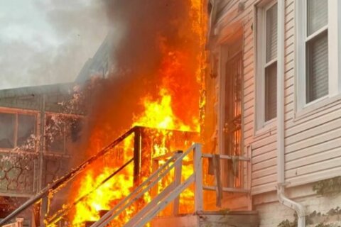 At least 8 displaced after Northwest DC fire chars rowhouse