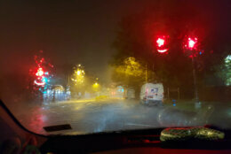 view through car windshield of rain