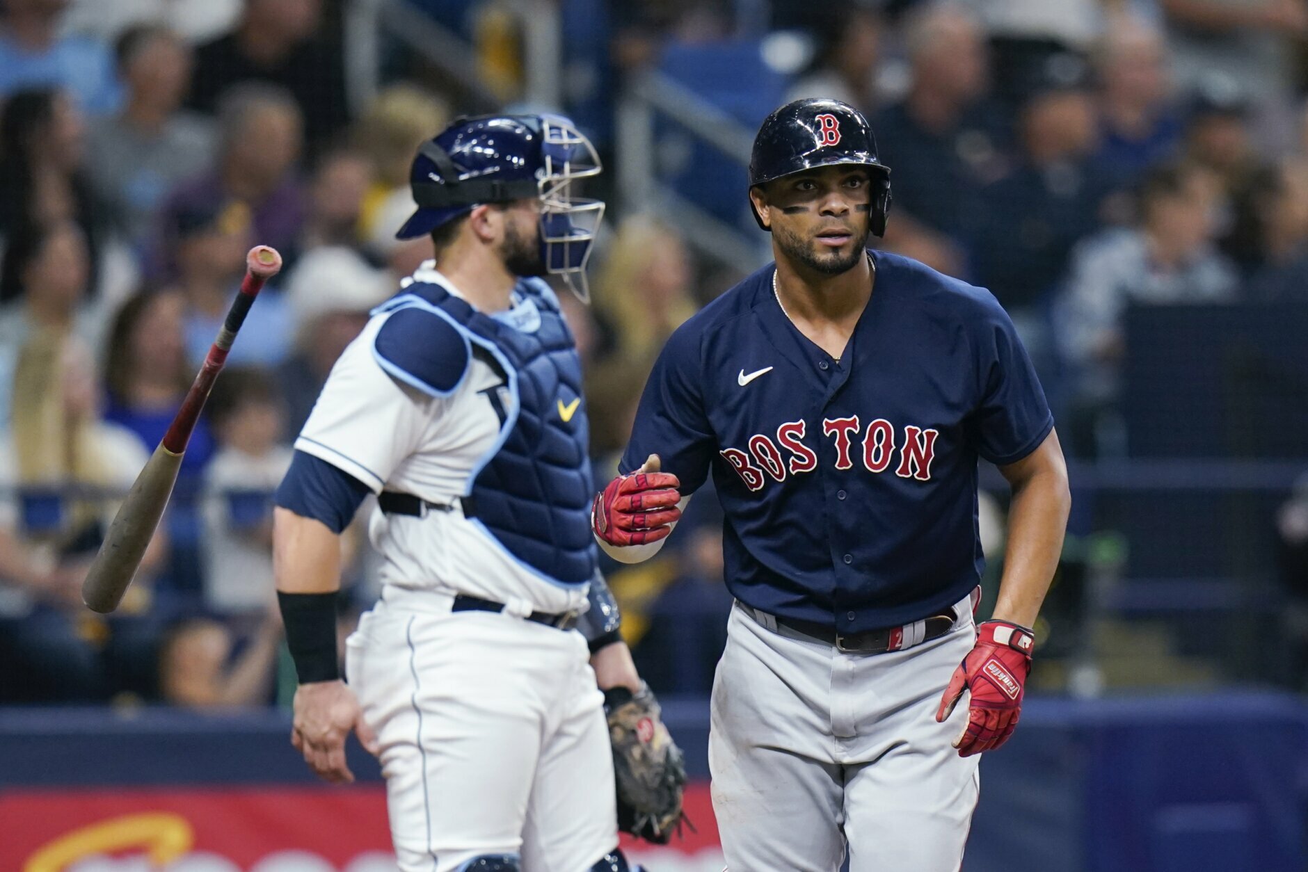Boston Red Sox's Xander Bogaerts is congratulated after his solo