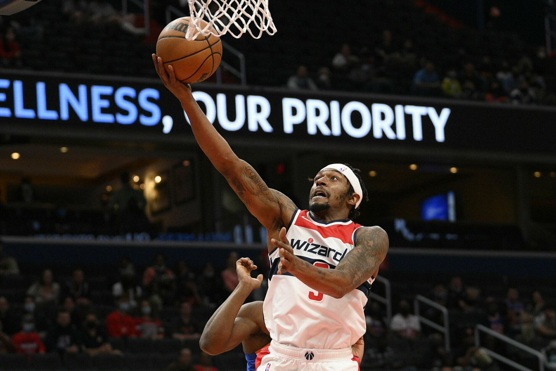 Washington Wizards guard Bradley Beal (3) goes to the basket during the first half of an NBA preseason basketball game against the New York Knicks, Saturday, Oct. 9, 2021, in Washington. (AP Photo/Nick Wass)