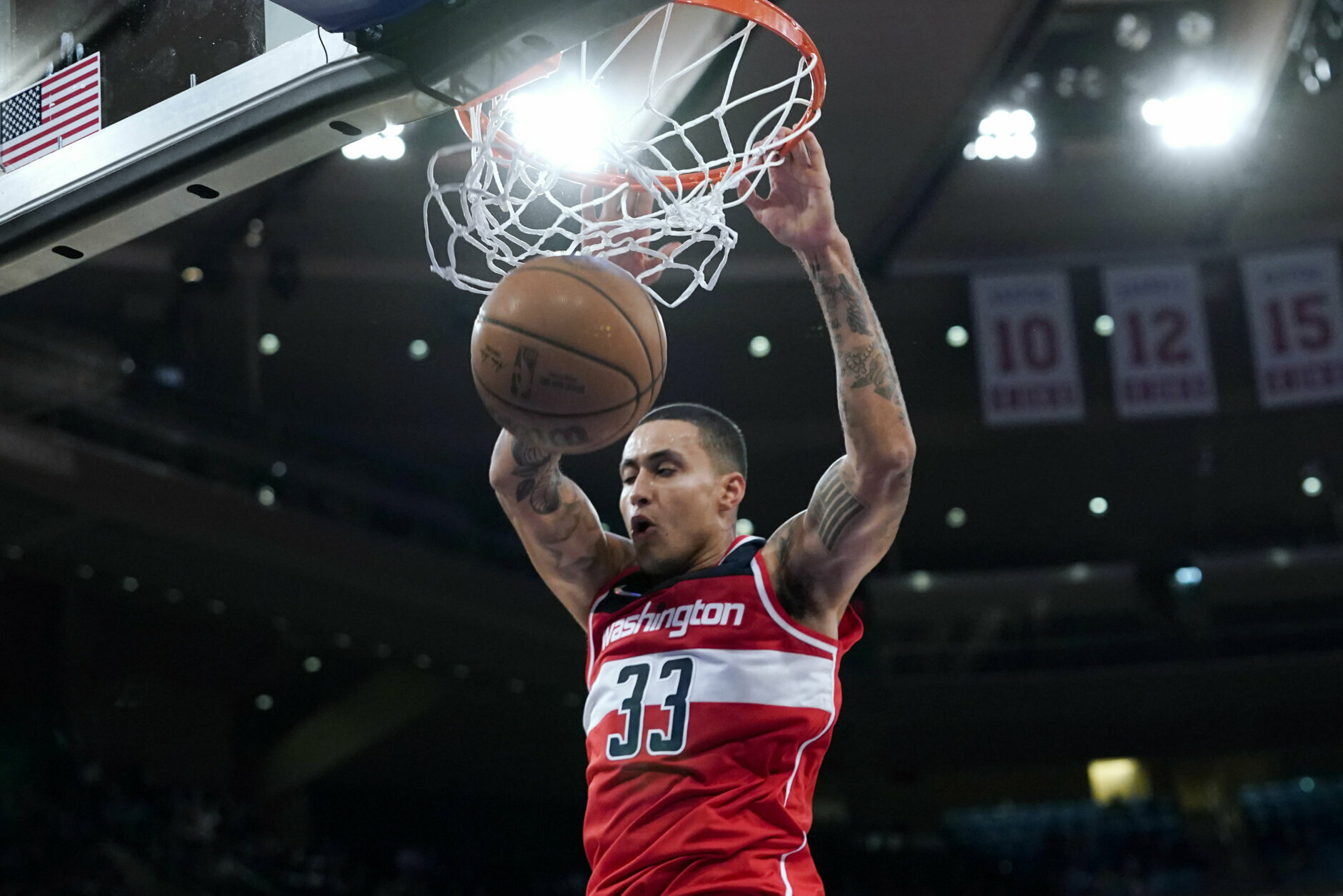 Washington Wizards forward Kyle Kuzma dunks during the first half of the team's preseason NBA basketball game against the New York Knicks, Friday, Oct. 15, 2021, at Madison Square Garden in New York. (AP Photo/Mary Altaffer)