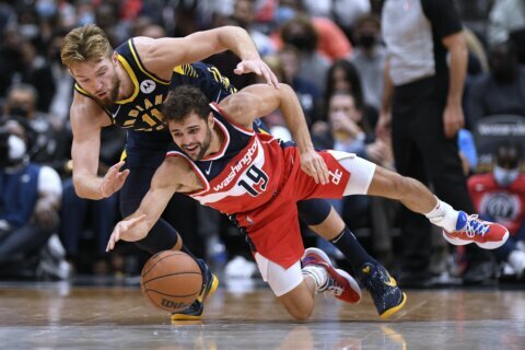 Dinwiddie leads Wizards to 135-134 OT win over Pacers