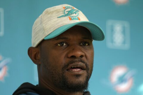 Fired Miami Dolphins coach sues NFL, alleging racist hiring