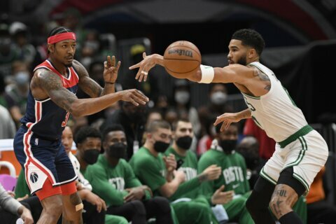 Beal, Dinwiddie lead Wizards past Celtics, 115-112 in 2 OTs