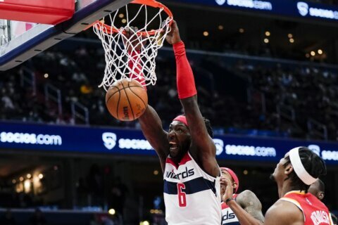 Beal, Harrell lead Wizards over Hawks 122-111