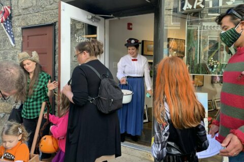 Trick or treating on Main Street Ellicott City is back, and so are the crowds