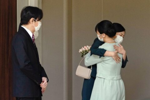 Japan's Princess Mako marries commoner, loses royal status