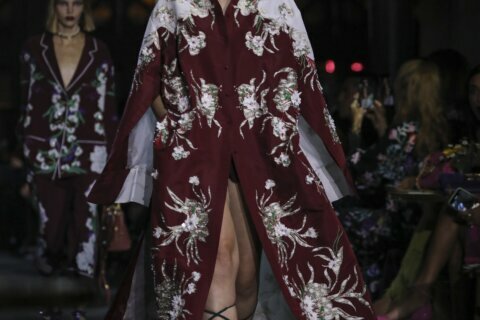 Valentino says it with flowers at Paris Fashion Week show