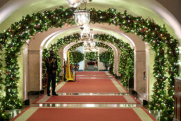The Center Hall of the White House is decorated for the holiday season during a press preview of the White House holiday decorations, Monday, Nov. 29, 2021, in Washington. (AP Photo/Evan Vucci)