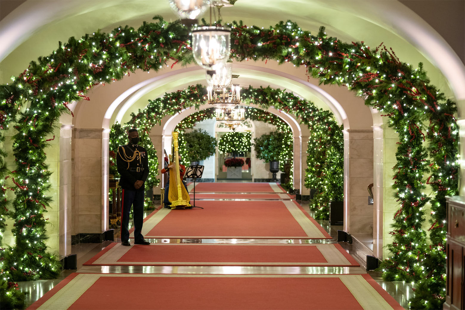 The Center Hall of the White House is decorated for the holiday season during a press preview of the White House holiday decorations, Monday, Nov. 29, 2021, in Washington. (AP Photo/Evan Vucci)