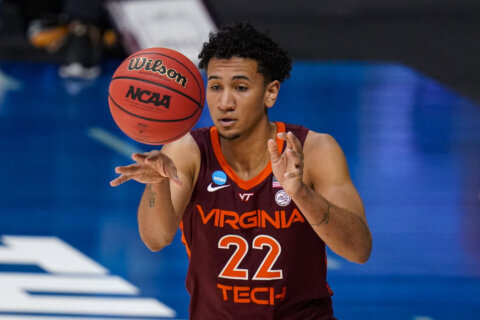Aluma takes over late, Virginia Tech beats Virginia, 62-53