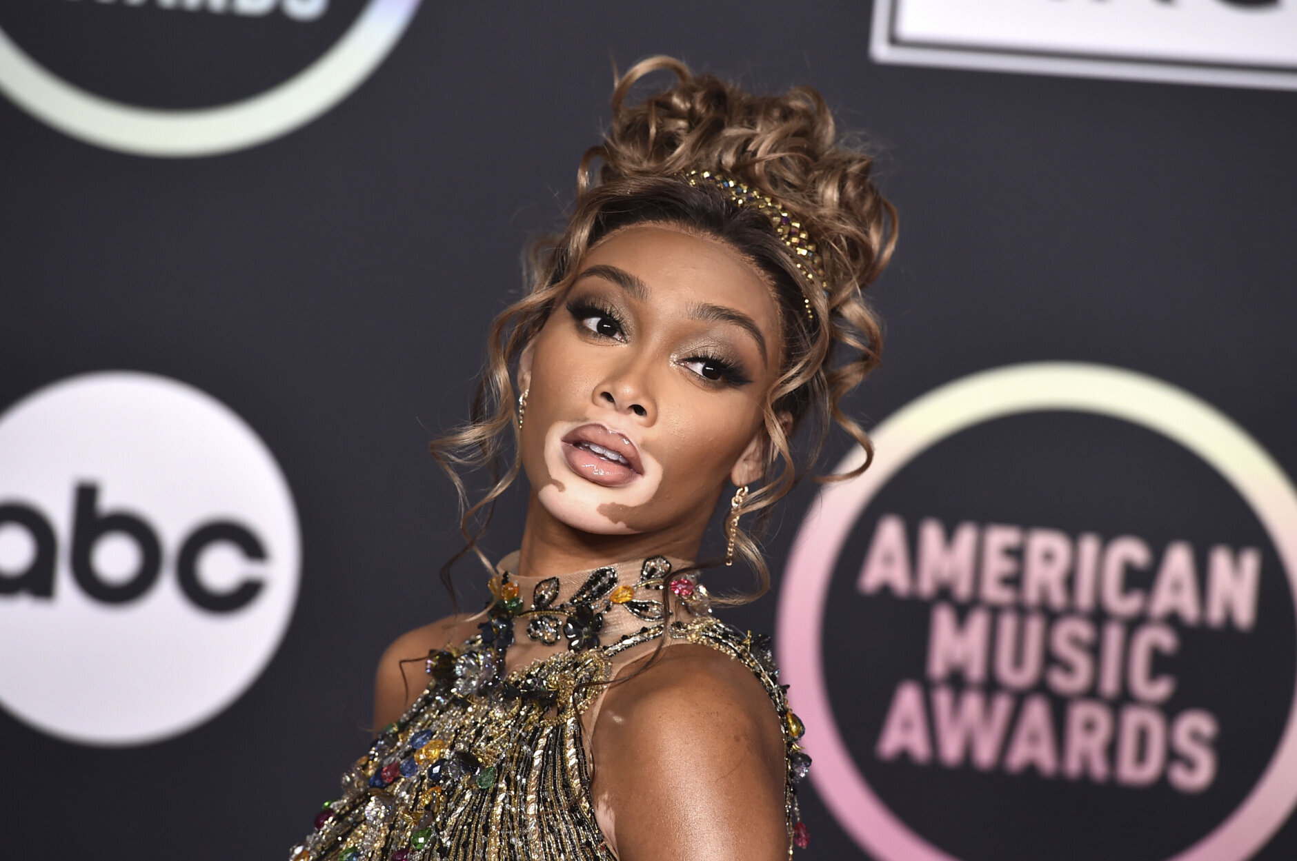 Winnie Harlow arrives at the American Music Awards on Sunday, Nov. 21, 2021, at Microsoft Theater in Los Angeles. (Photo by Jordan Strauss/Invision/AP)