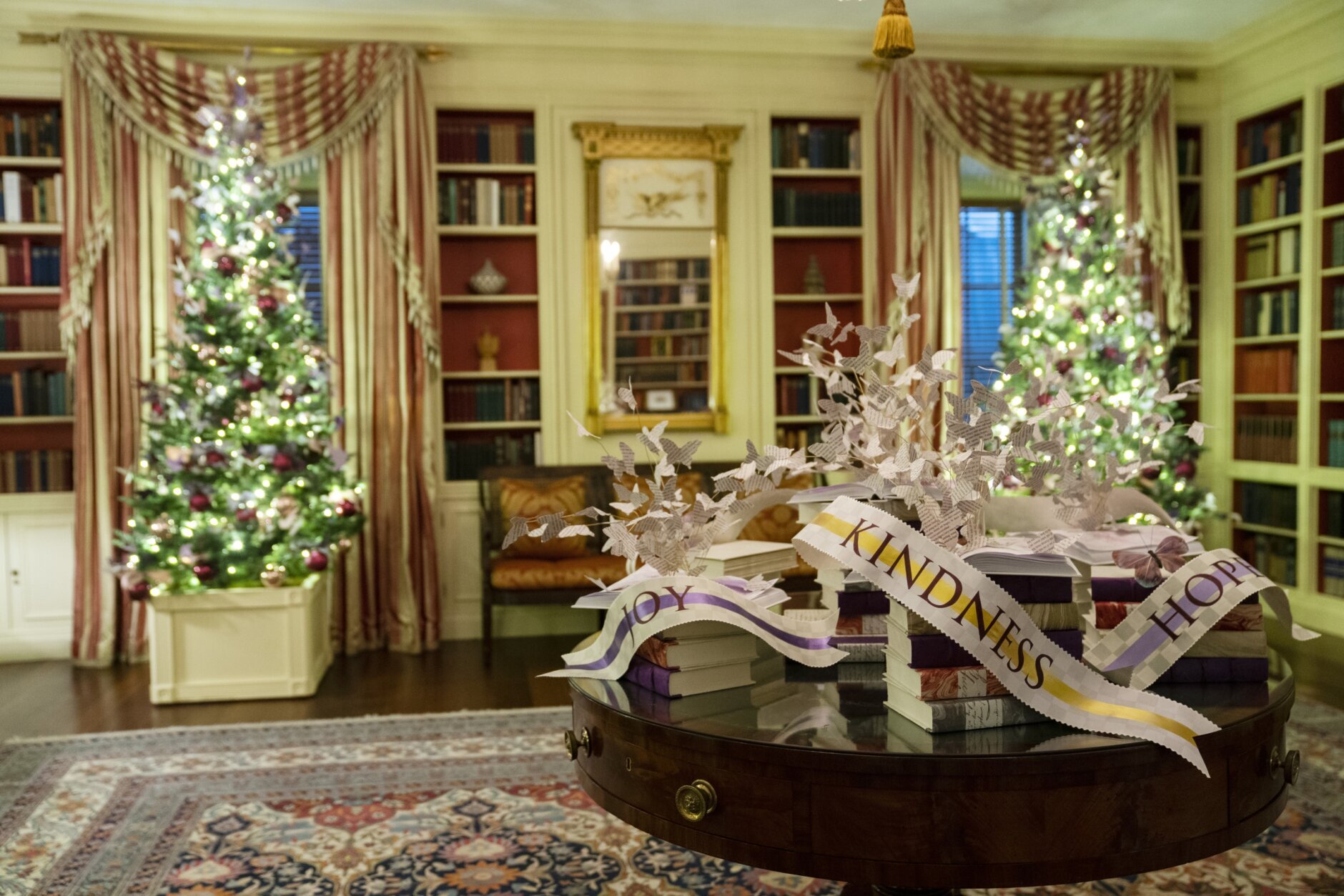 The Vermeil Room of the White House is decorated for the holidays during a press preview of the White House holiday decorations, Monday, Nov. 29, 2021, in Washington. (AP Photo/Evan Vucci)