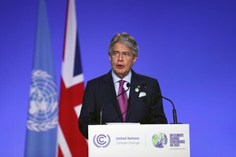 The Latest: UK sets net-zero plan for its financial sector