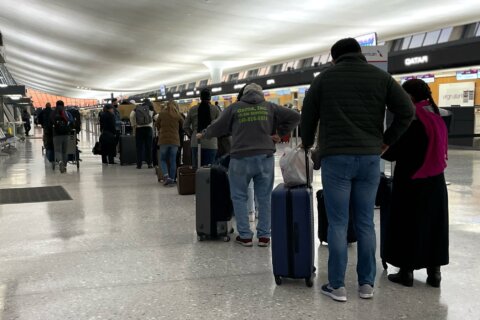 As Thanksgiving travel returns, Dulles passengers say they’re comfortable but cautious