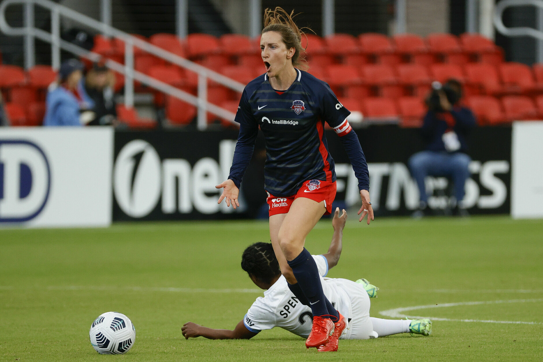 Andi Sullivan #12 of Washington Spirit reacts after fouling Jasmyne Spencer #22 of Houston Dash during the first half at Audi Field on Oct. 31, 2021 in Washington, DC. (Photo by Tim Nwachukwu/Getty Images)