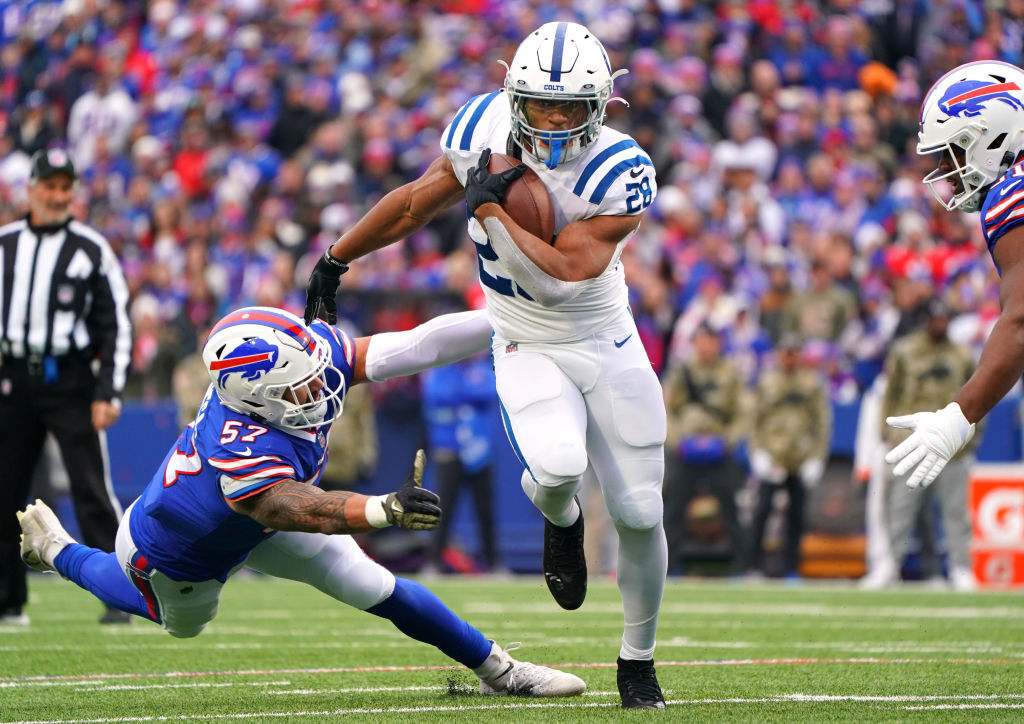 <p><em><strong>Colts 41</strong></em><br />
<em><strong>Bills 15</strong></em></p>
<p>Jonathan Taylor is quietly having <a href="https://twitter.com/ESPNStatsInfo/status/1462516070804344840?s=20" target="_blank" rel="noopener">one of the best and incredibly consistent seasons in NFL history</a>, shredding the No. 1 defense in the league for the first five touchdown game by an Indianapolis Colt. Indy might finally be living up to its high preseason expectations.</p>
