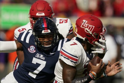 No. 15 Ole Miss beats Liberty and former coach Freeze, 27-14