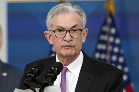 Powell says Fed may accelerate pullback in economic support