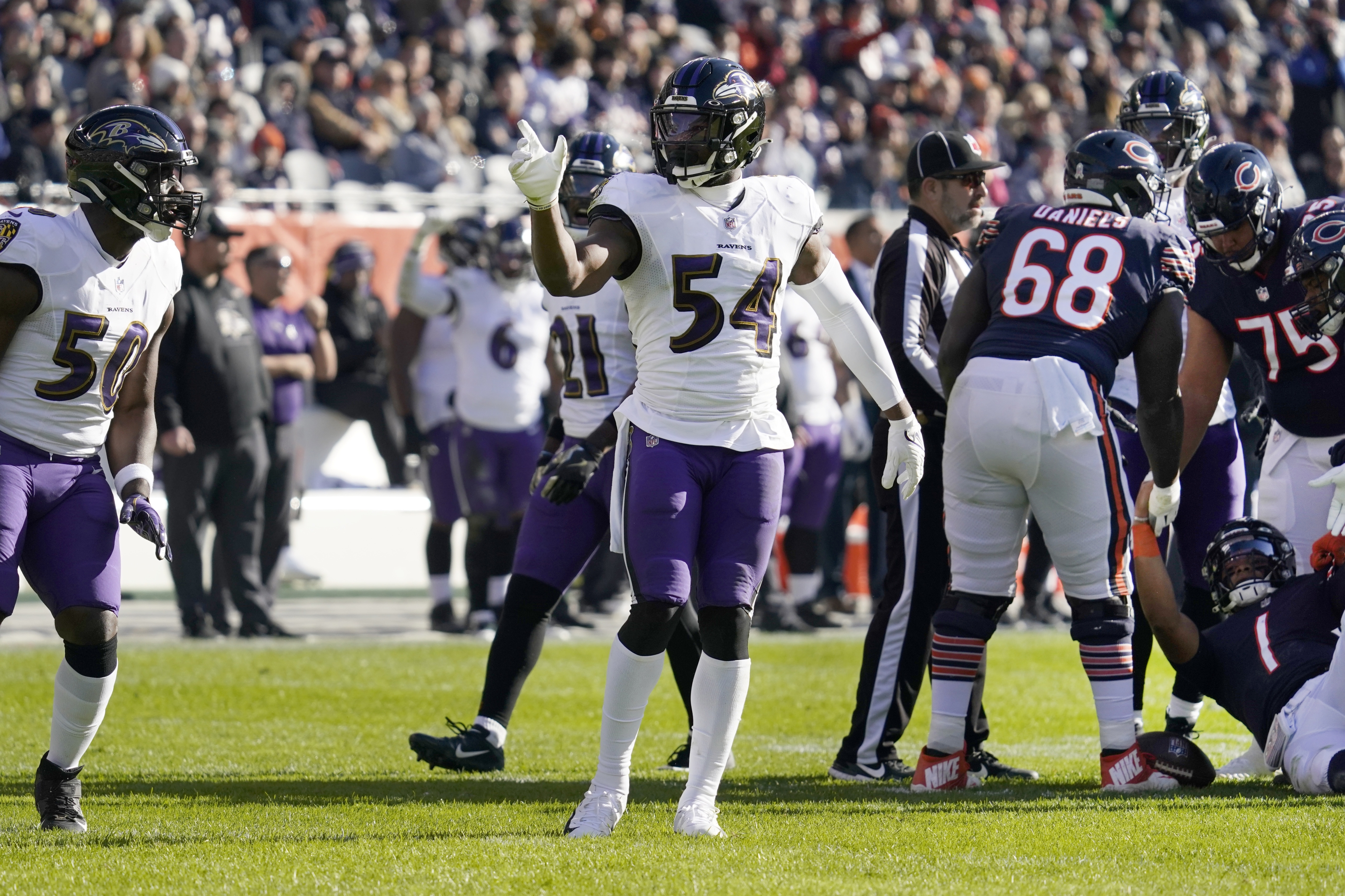 Baltimore Ravens kicker Justin Tucker (9) and Sam Koch (4) celebrate after  Tucker made a field …