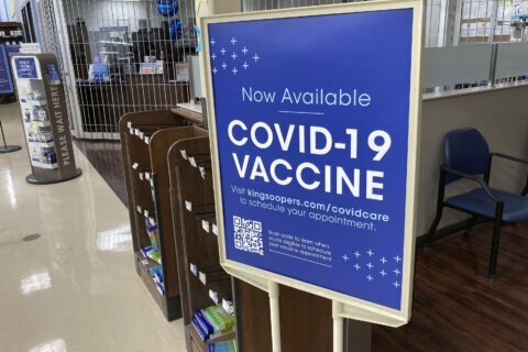 Government: Vaccine rule should remain while cases play out