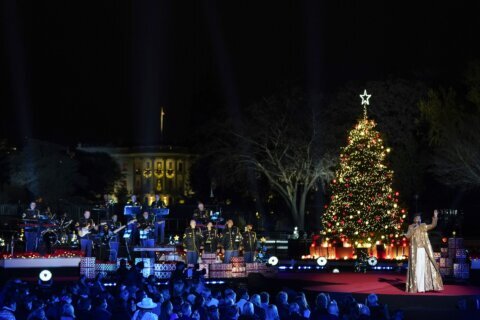PHOTOS: Biden helps light National Christmas Tree near White House