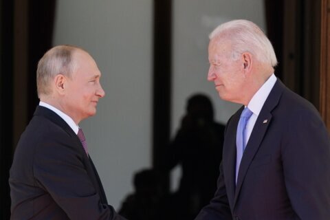 Biden talks sanctions, Putin warns of rupture over Ukraine