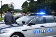Two men charged after trying to hit Virginia state trooper, police say