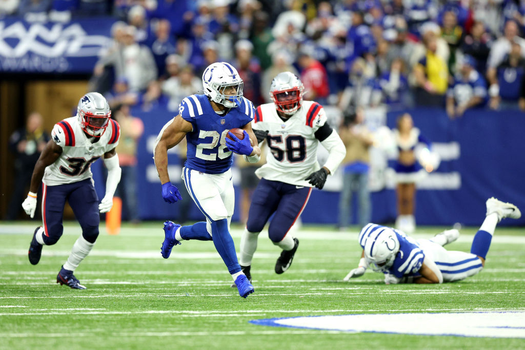 <p><em><strong>Patriots 17</strong></em><br />
<em><strong>Colts 27</strong></em></p>
<p>Forget what Jonathan Taylor is doing for fantasy teams — his 11 straight games with a rushing touchdown is carrying Indianapolis at a time when <a href="https://www.indystar.com/story/sports/nfl/colts/2021/12/18/colts-qb-carson-wentz-trades-words-patriots-lb-matthew-judon/8957976002/" target="_blank" rel="noopener">Carson Wentz is trying to reclaim his manhood in more ways than one</a>.</p>
