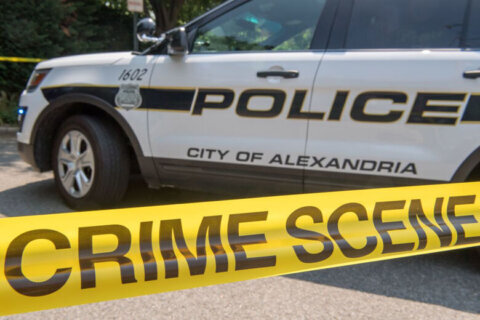 Alexandria man charged with firing at police during barricade situation