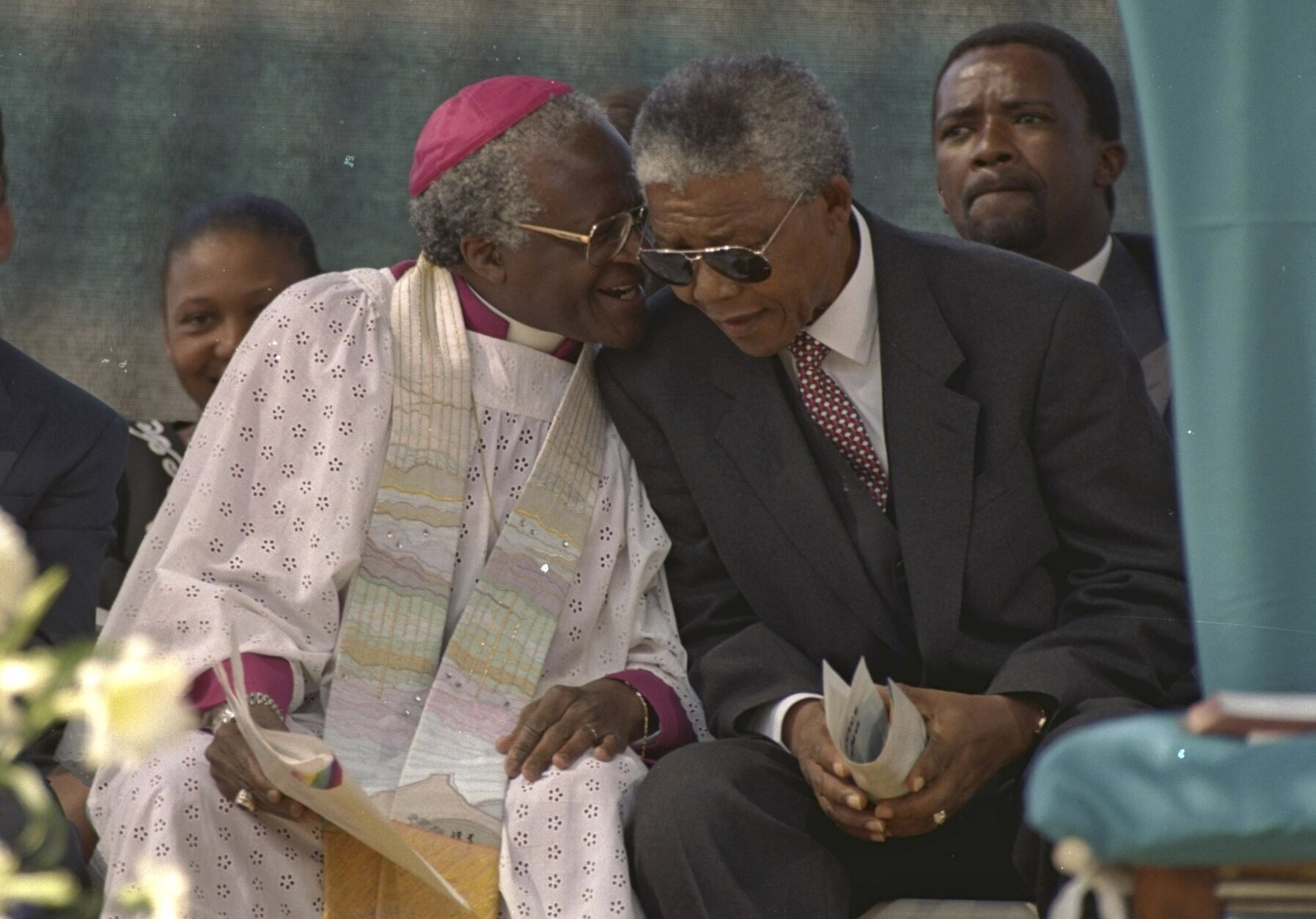 <p>Tutu (left) and South Africa&#8217;s then-president-elect, Nelson Mandela, talk during celebrations in Soweto, South Africa, in this 1994 file photo.</p>
