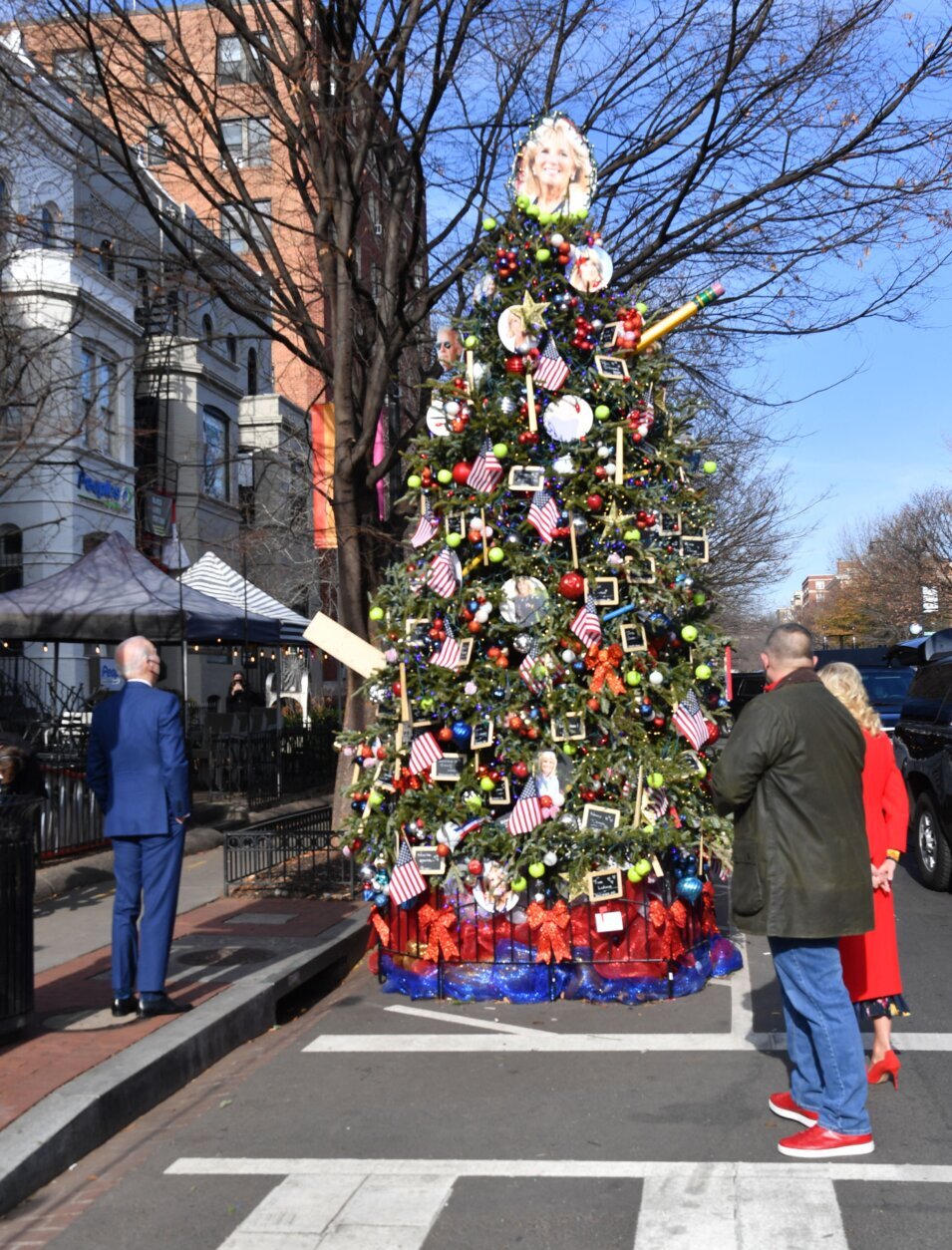US President Joe Biden visits the Christmas Tree in honor of First Lady Jill Biden outside Floriana Italian Restaurant in Washington, DC, on December 24, 2021. (Photo by Nicholas Kamm / AFP) (Photo by NICHOLAS KAMM/AFP via Getty Images)